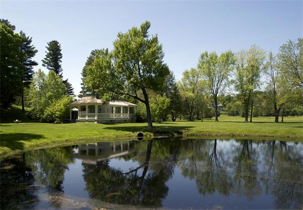 15 Hamlins Crossing West Dover, MA 02030 - Photo 9 of 23 a view of a lake with a yard and large trees