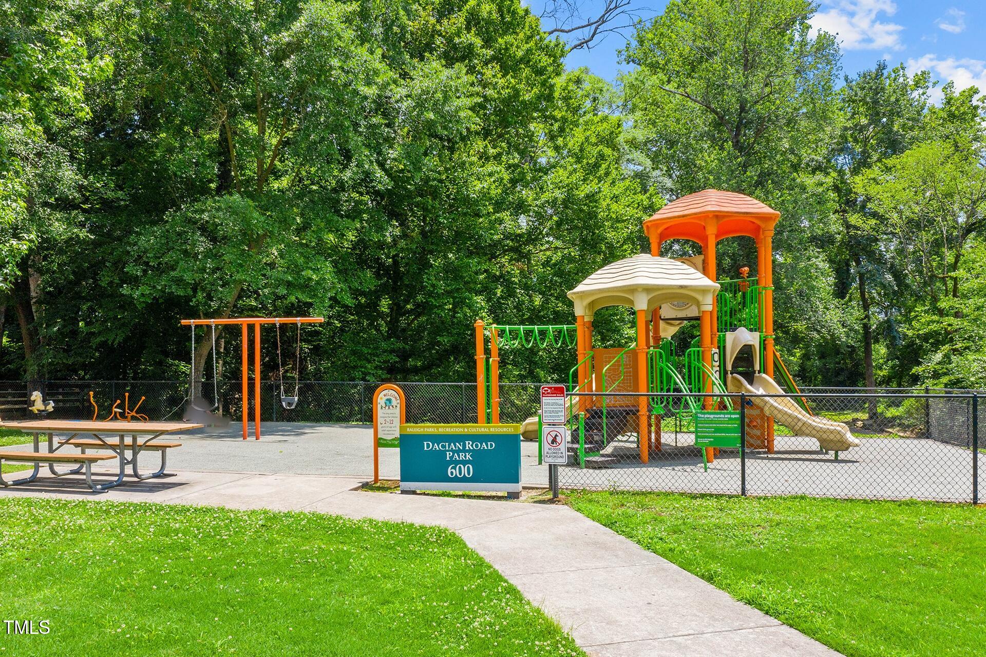 564 Dacian Road Raleigh, NC 27610 - Photo 7 of 16 a view of a park with slide