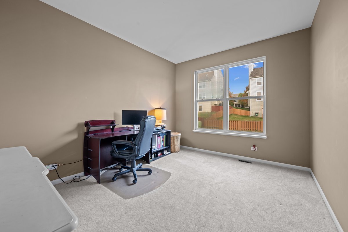 312 Monument Road Elgin, IL 60124 - Photo 24 of 44 a view of workspace with windows