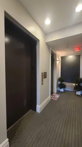 a front view of a building with a glass door