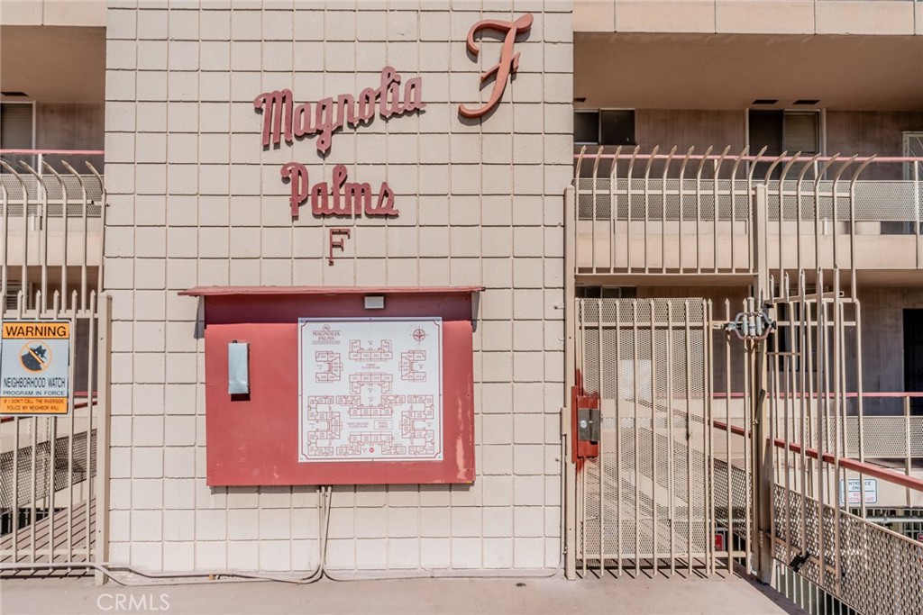 6979 Palm Court, Unit 319F Riverside, CA 92506 - Photo 2 of 44 a sign on the wall of a building