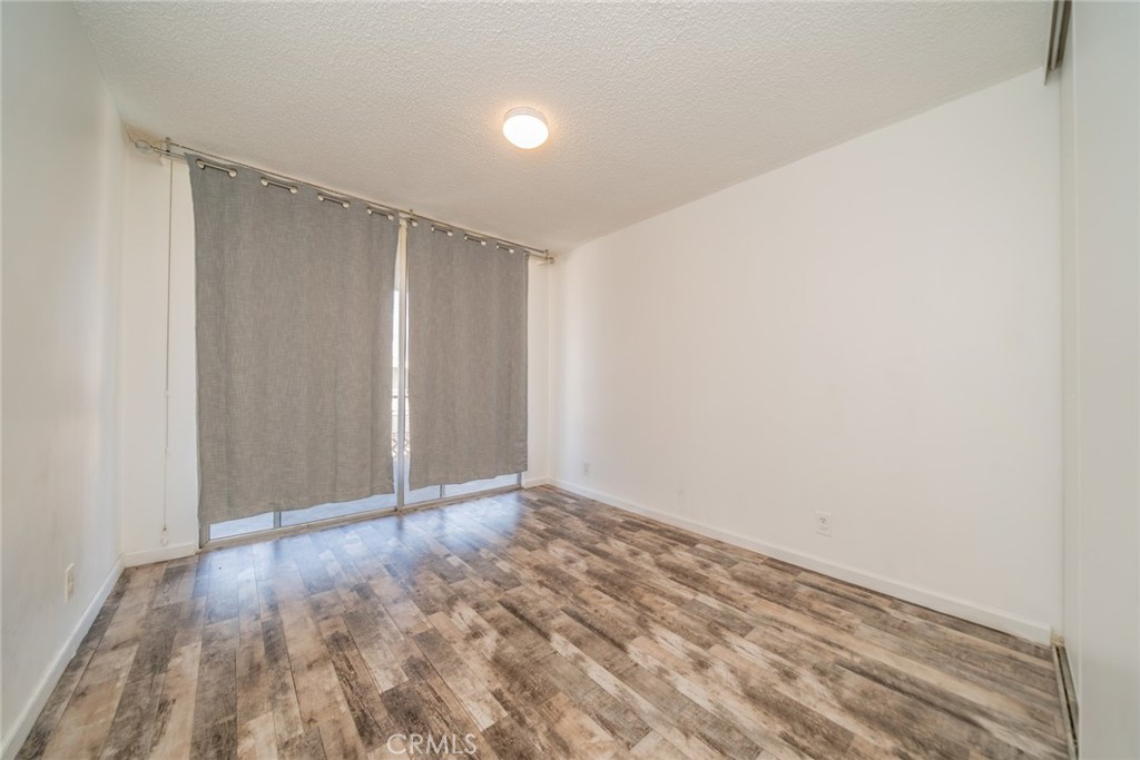 6979 Palm Court, Unit 319F Riverside, CA 92506 - Photo 21 of 44 a view of an empty room