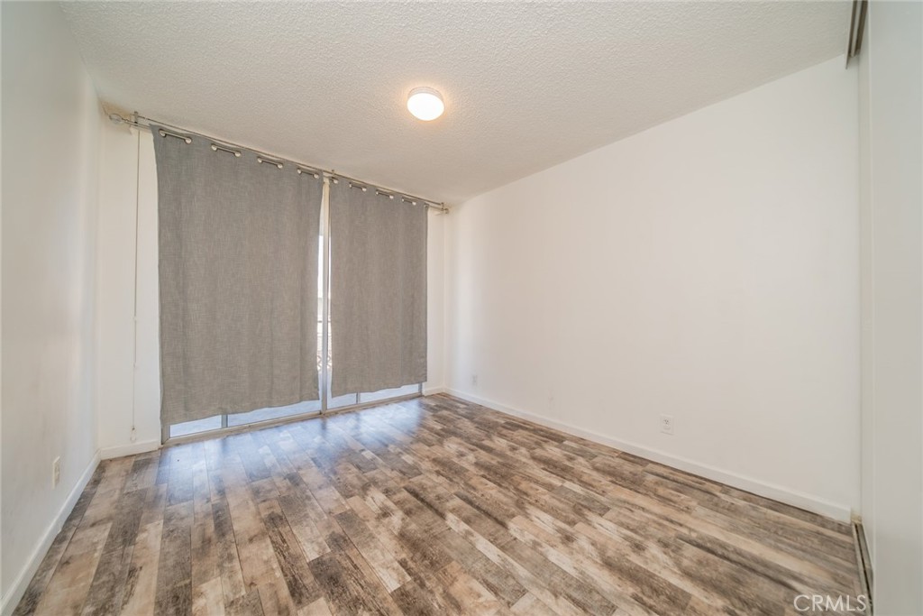 6979 Palm Court, Unit 319F Riverside, CA 92506 - Photo 21 of 44 a view of an empty room