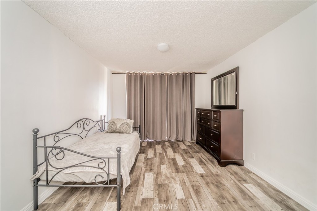 6979 Palm Court, Unit 319F Riverside, CA 92506 - Photo 23 of 44 a view of a livingroom with furniture and staircase