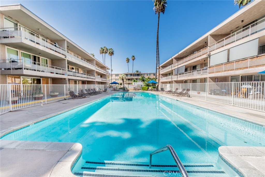 6979 Palm Court, Unit 319F Riverside, CA 92506 - Photo 30 of 44 a view of a building with sitting area