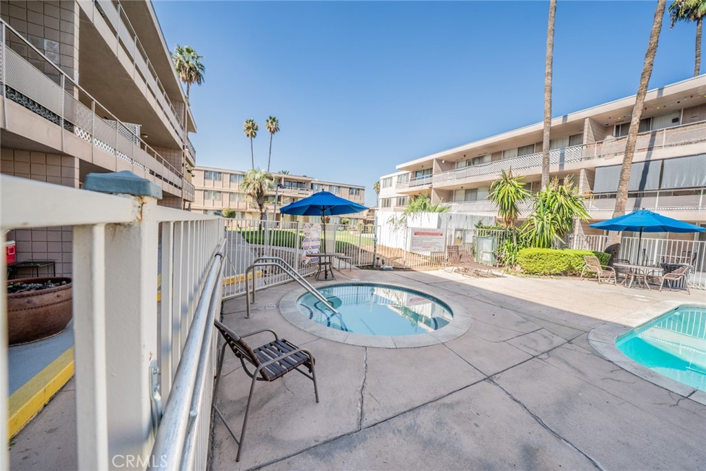 6979 Palm Court, Unit 319F Riverside, CA 92506 - Photo 31 of 44 a dinning table and chairs in patio