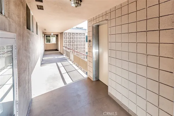a view of a backyard with sitting area