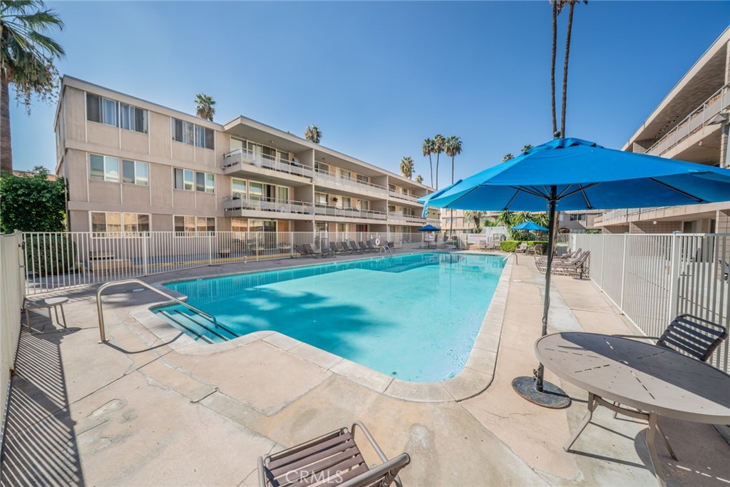 6979 Palm Court, Unit 319F Riverside, CA 92506 - Photo 35 of 44 a view of a backyard with sitting area