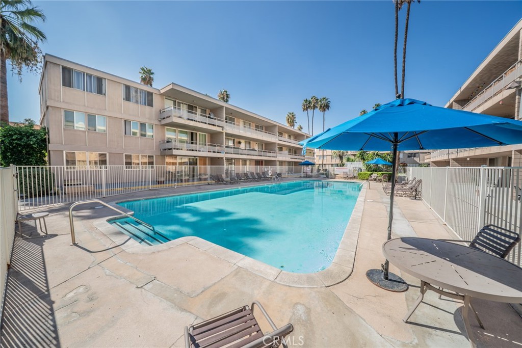 6979 Palm Court, Unit 319F Riverside, CA 92506 - Photo 35 of 44 a view of a backyard with sitting area