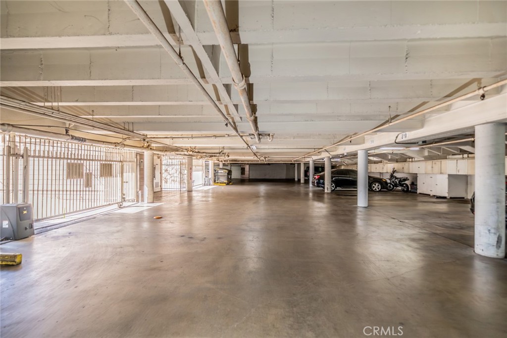 6979 Palm Court, Unit 319F Riverside, CA 92506 - Photo 37 of 44 a view of an empty room with wooden floor