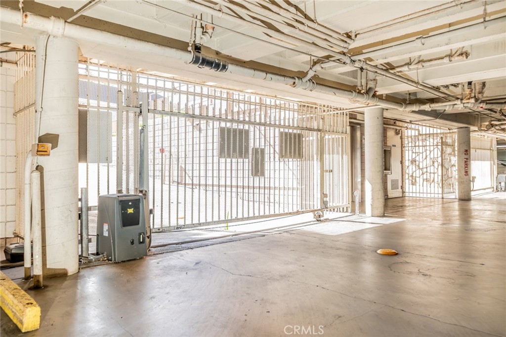 6979 Palm Court, Unit 319F Riverside, CA 92506 - Photo 39 of 44 a view of a livingroom with wooden floor and a window