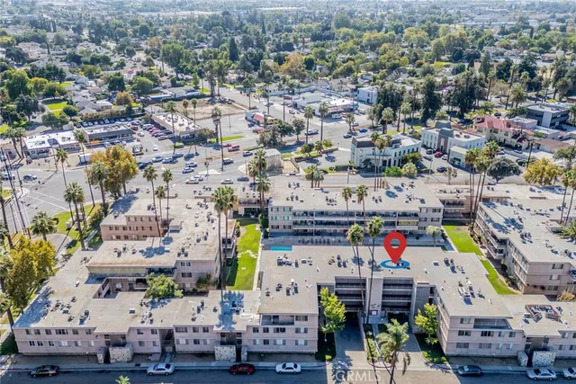an aerial view of residential house with outdoor space