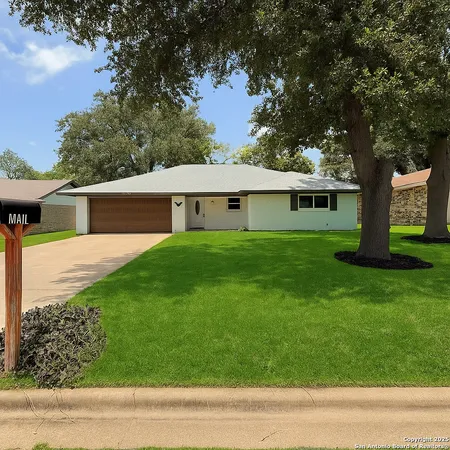 a house view with a garden space