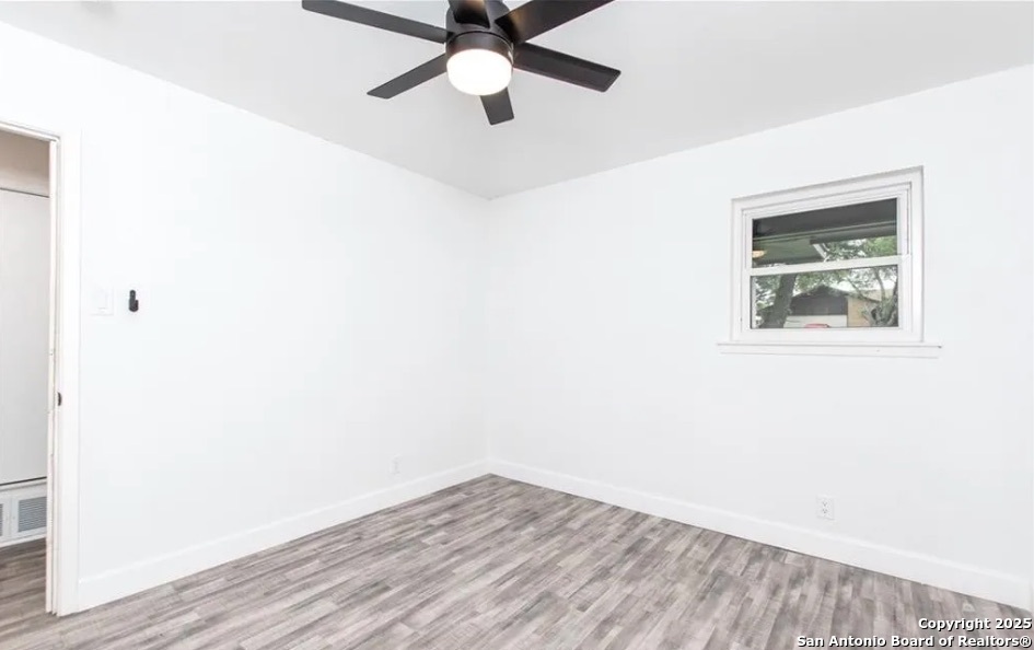 902 Concord Drive Temple, TX 76504 - Photo 17 of 24 a view of empty room with wooden floor