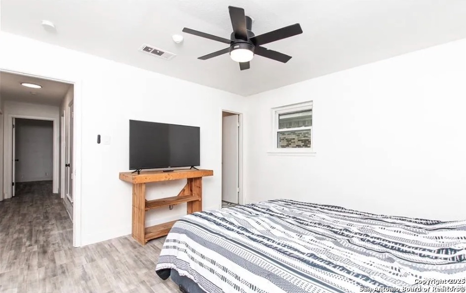 902 Concord Drive Temple, TX 76504 - Photo 20 of 24 a bedroom with a bed and a flat screen tv