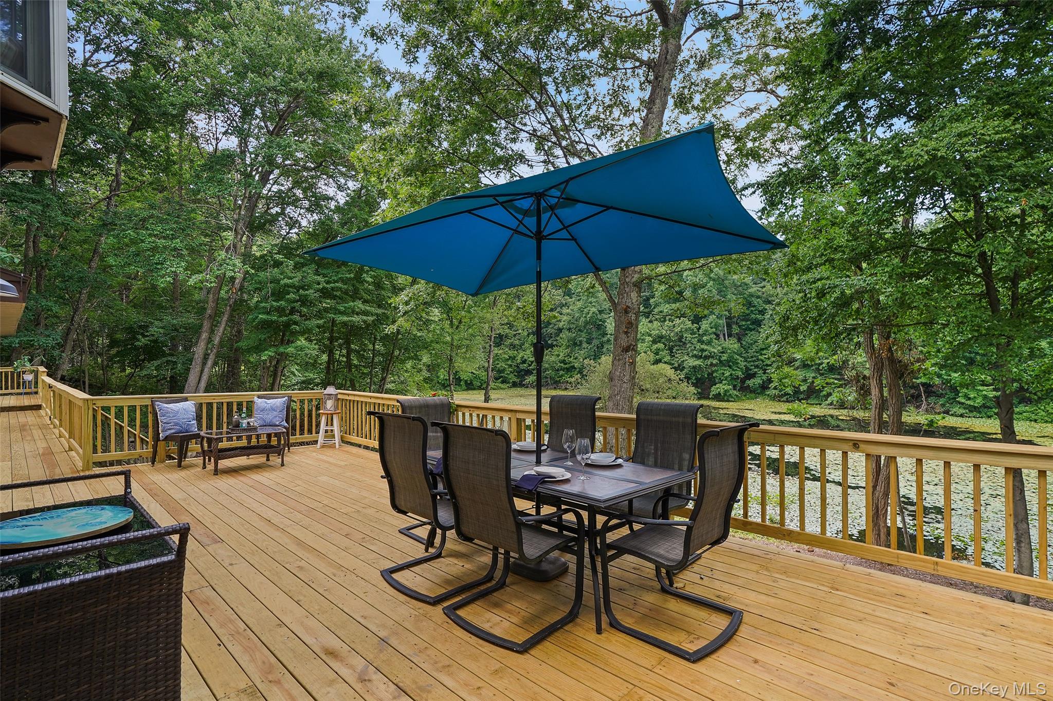 18 Sylvan Road Lake Peekskill, NY 10537 - Photo 37 of 50 Spacious deck with room enough to host large gatherings