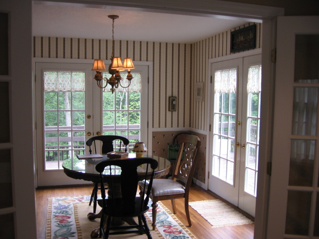 894 Colebrook River Road Tolland, MA 01034 - Photo 22 of 22 a view of a dining room with furniture window and wooden floor