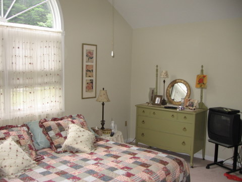 894 Colebrook River Road Tolland, MA 01034 - Photo 8 of 22 a bedroom with a bed and a window