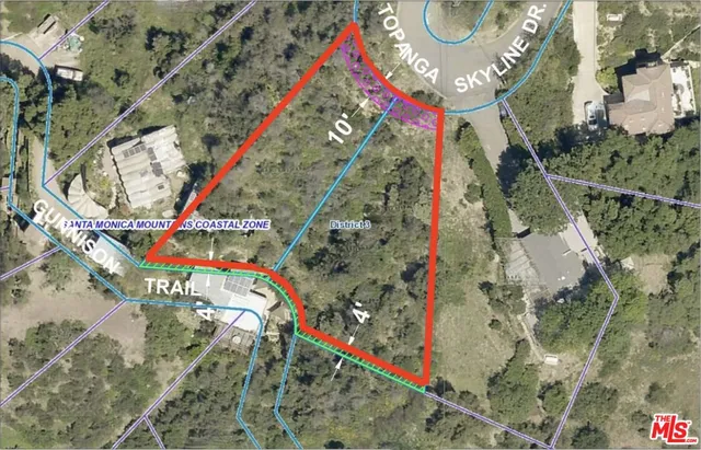 a view of a road with a ocean view