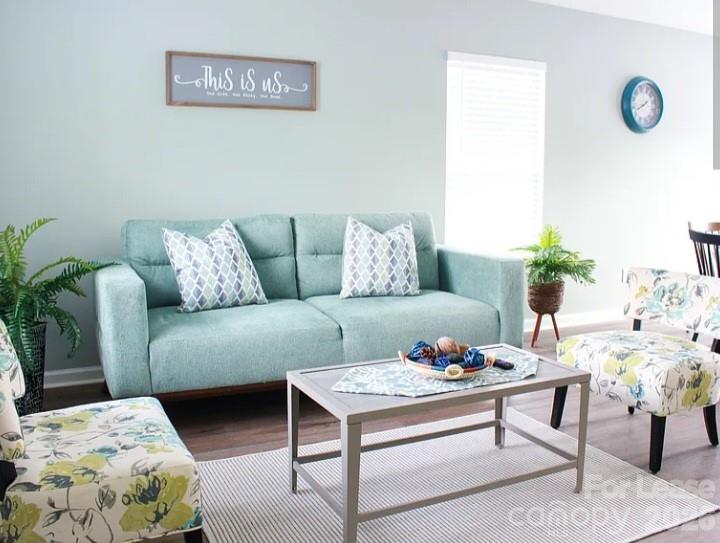 2027 Pimpernel Road Charlotte, NC 28213 - Photo 2 of 12 a living room with furniture and a table