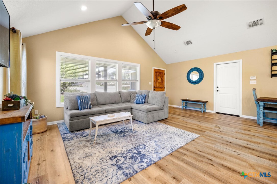 1306 Live Oak Drive Spring Branch, TX 78070 - Photo 3 of 18 a living room with furniture and a large window
