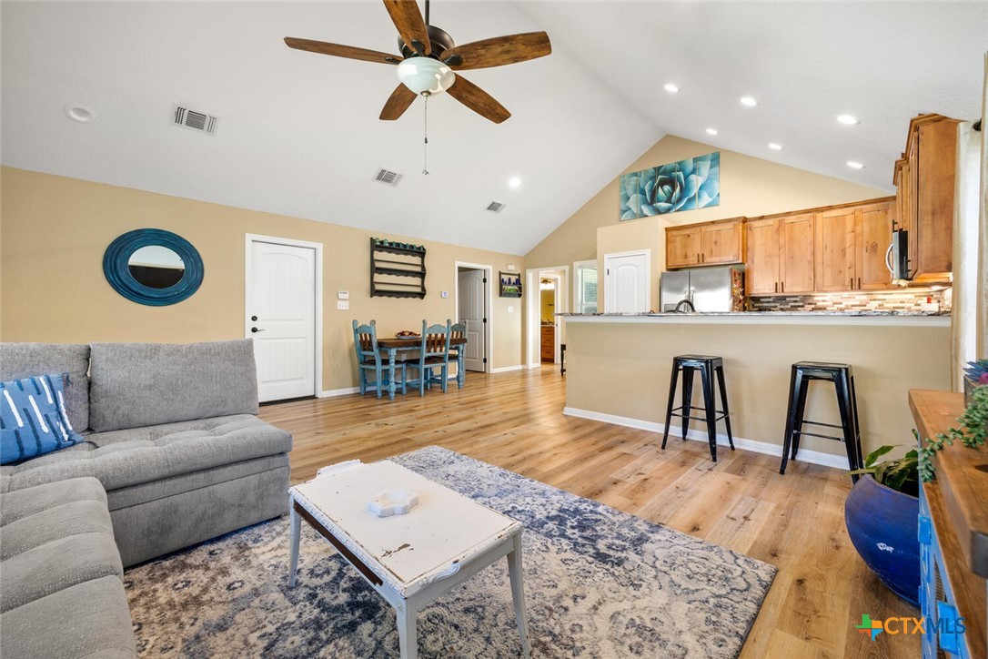 1306 Live Oak Drive Spring Branch, TX 78070 - Photo 5 of 18 a living room with furniture and wooden floor