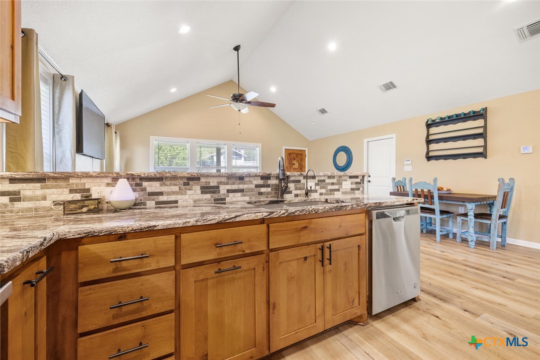 1306 Live Oak Drive Spring Branch, TX 78070 - Photo 9 of 18 a kitchen with lots of counter space and windows