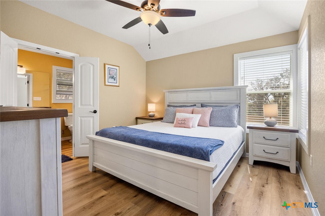 1306 Live Oak Drive Spring Branch, TX 78070 - Photo 10 of 18 a bedroom with a bed and a window