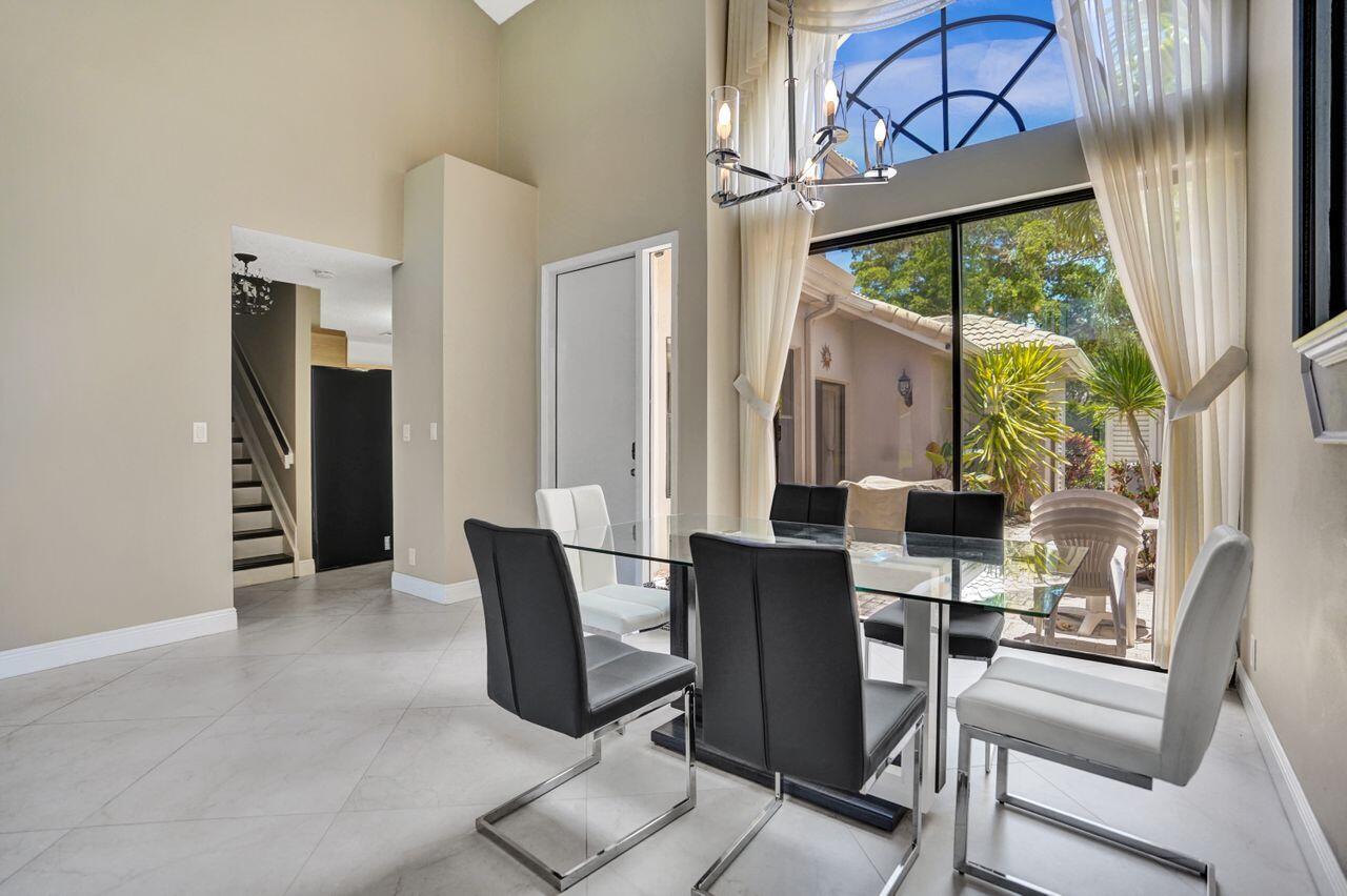 5465 Monterey Circle, Unit D Delray Beach, FL 33484 - Photo 16 of 67 a view of a livingroom with furniture and a window