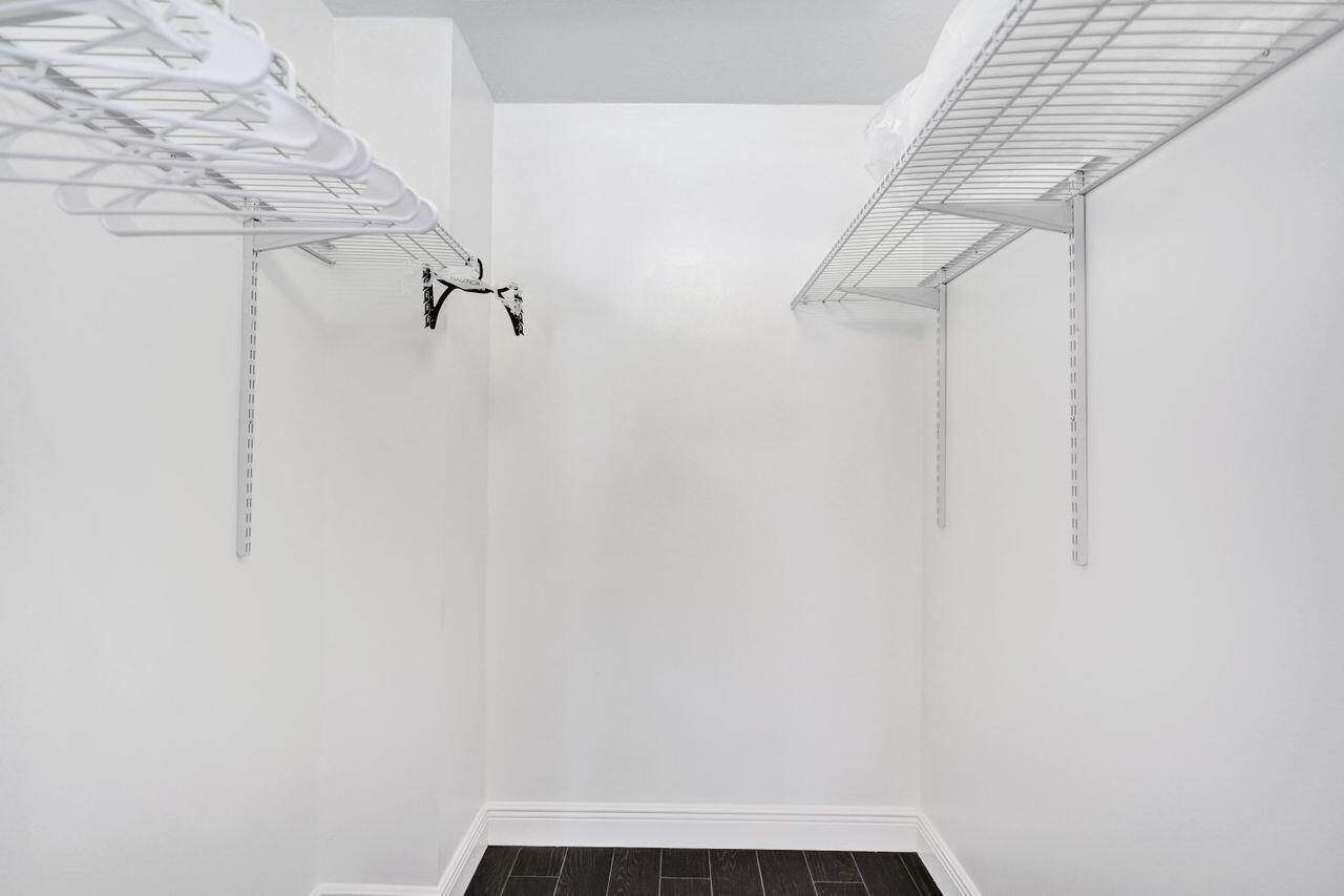 5465 Monterey Circle, Unit D Delray Beach, FL 33484 - Photo 54 of 67 a view of small space with empty racks
