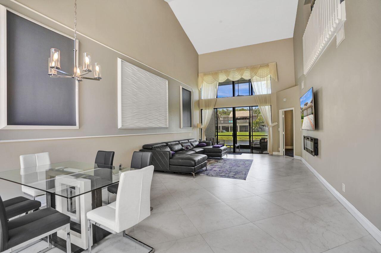 5465 Monterey Circle, Unit D Delray Beach, FL 33484 - Photo 9 of 67 a lobby with furniture and window