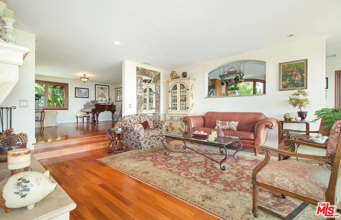 29660 Harvester Road Malibu, CA 90265 - Photo 11 of 32 a living room with furniture and wooden floor