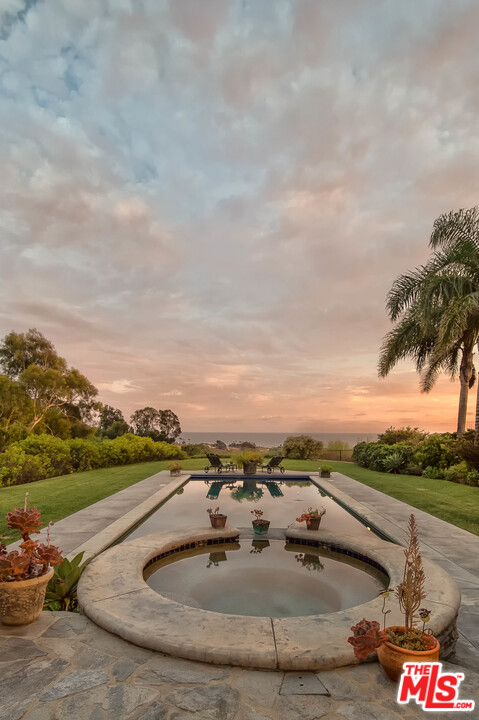 29660 Harvester Road Malibu, CA 90265 - Photo 29 of 32 an outdoor view with swimming pool and mountain view