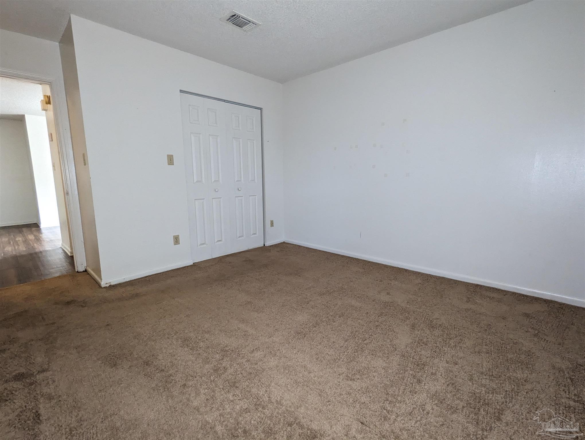 6288 Hamilton Bridge Road, Unit 301 Milton, FL 32570 - Photo 15 of 24 an empty room with an empty space