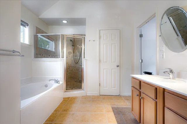 a view of bedroom with wooden floor