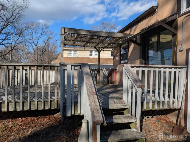a view of a chairs setting on the roof deck
