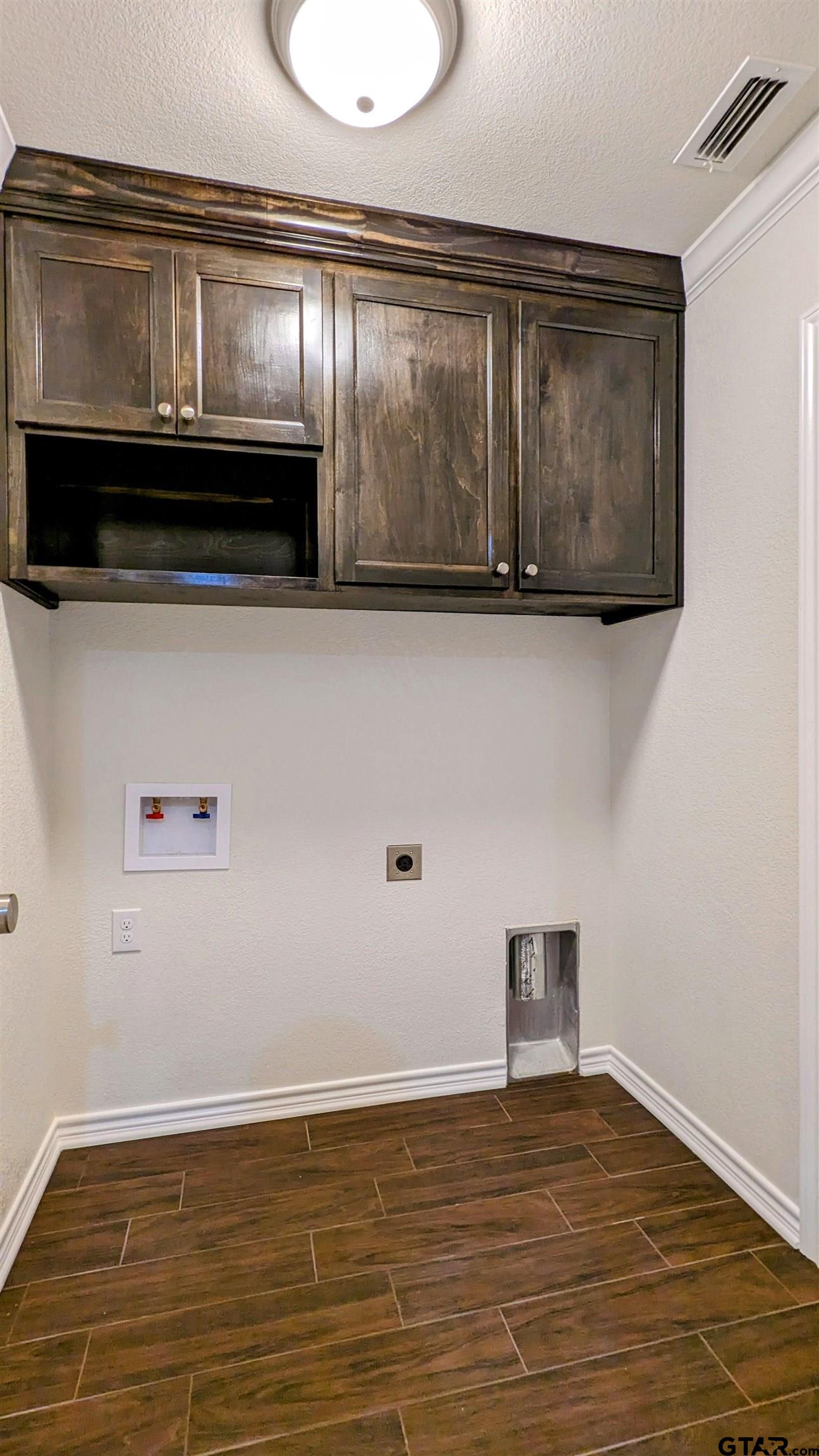 11086 County Road 167, Unit 11 Tyler, TX 75703 - Photo 17 of 20 a view of room with wooden floor