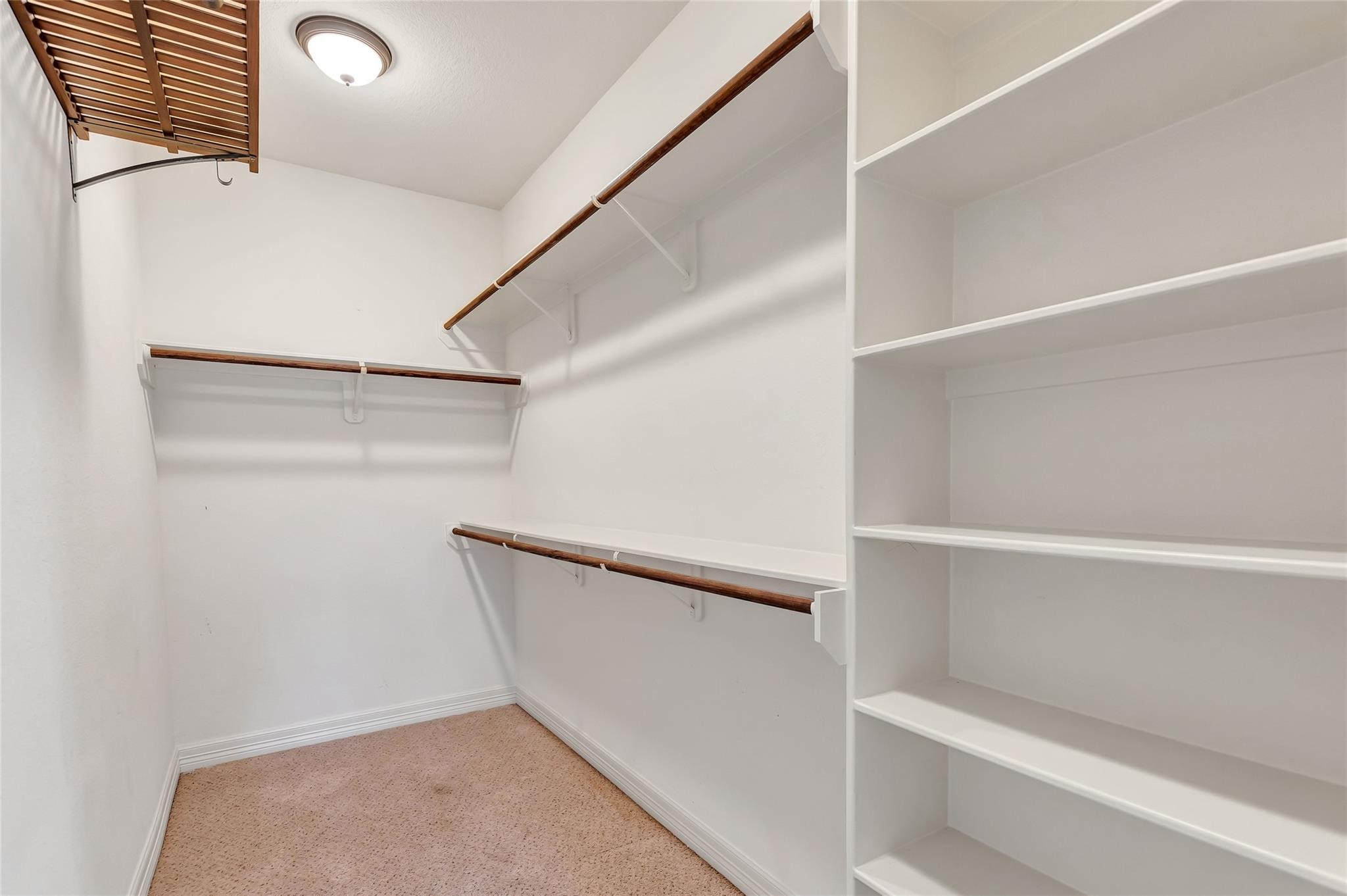 27684 Rio Blanco Drive Splendora, TX 77372 - Photo 18 of 37 a view of an empty walk in closet