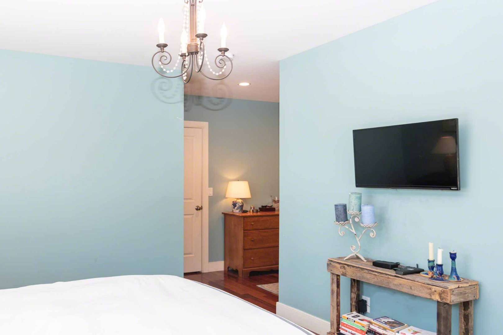 50 Red Pony Road Vineyard Haven, MA 02568 - Photo 15 of 28 a bedroom with a bed and a flat screen tv