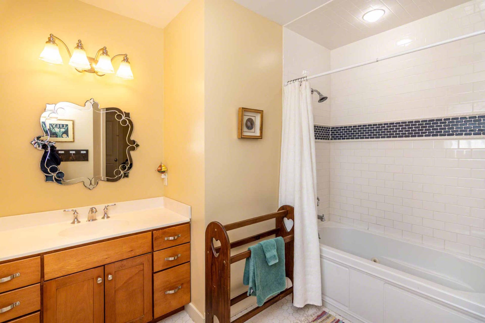 50 Red Pony Road Vineyard Haven, MA 02568 - Photo 20 of 28 a bathroom with a tub sink and mirror