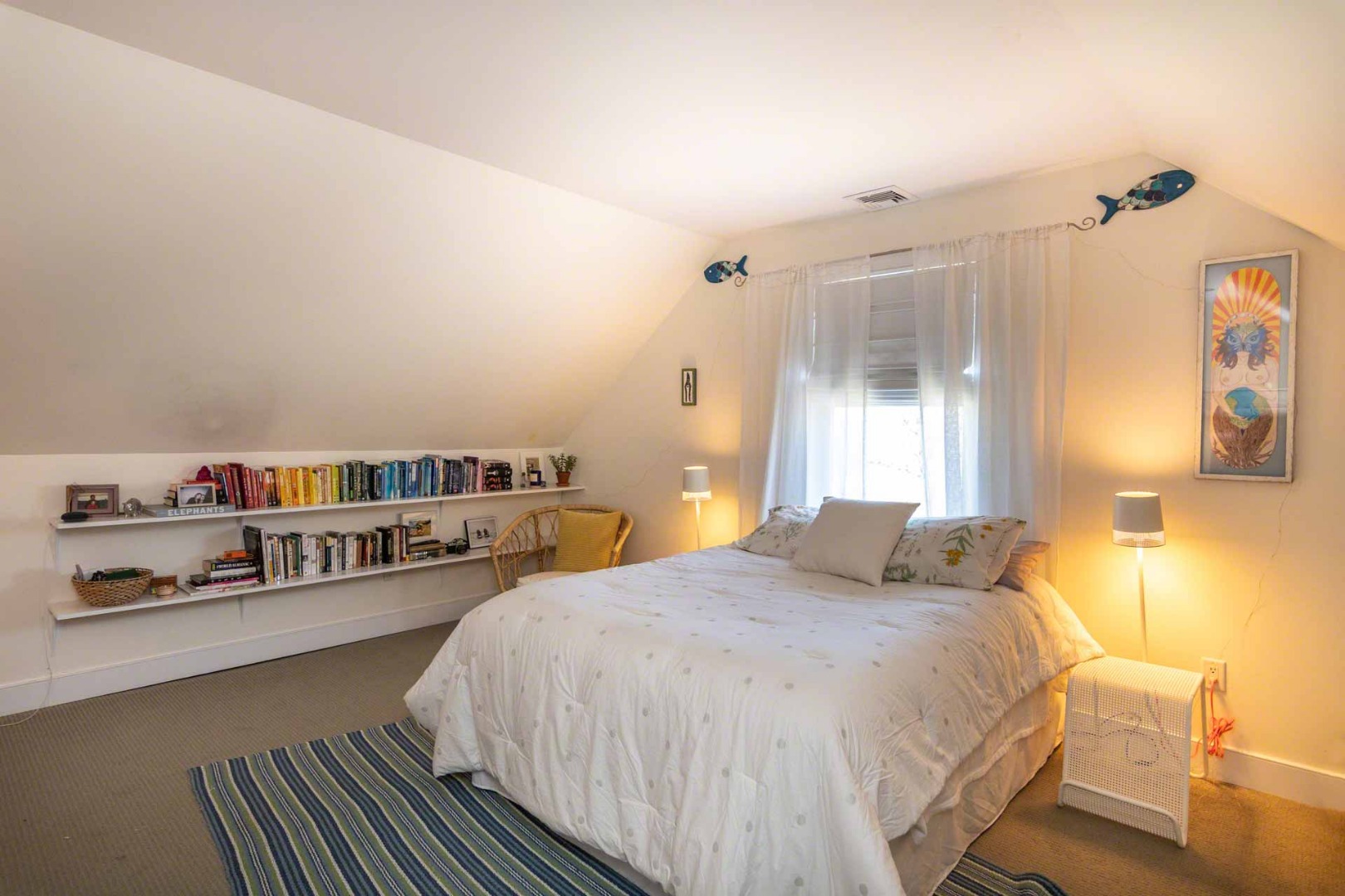 50 Red Pony Road Vineyard Haven, MA 02568 - Photo 22 of 28 a bedroom with a bed and a large window