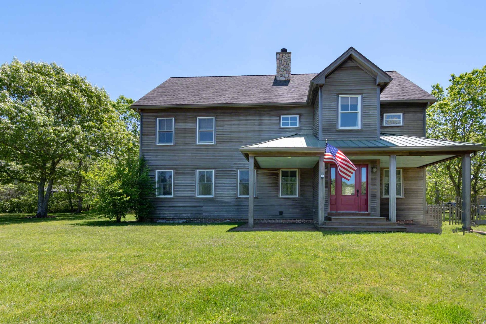 50 Red Pony Road Vineyard Haven, MA 02568 - Photo 28 of 28 a front view of a house with a yard