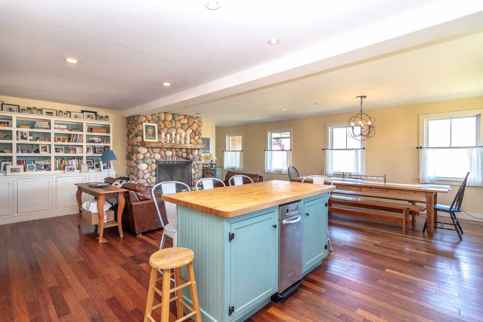 50 Red Pony Road Vineyard Haven, MA 02568 - Photo 10 of 28 a kitchen with a dining table chairs and wooden floor