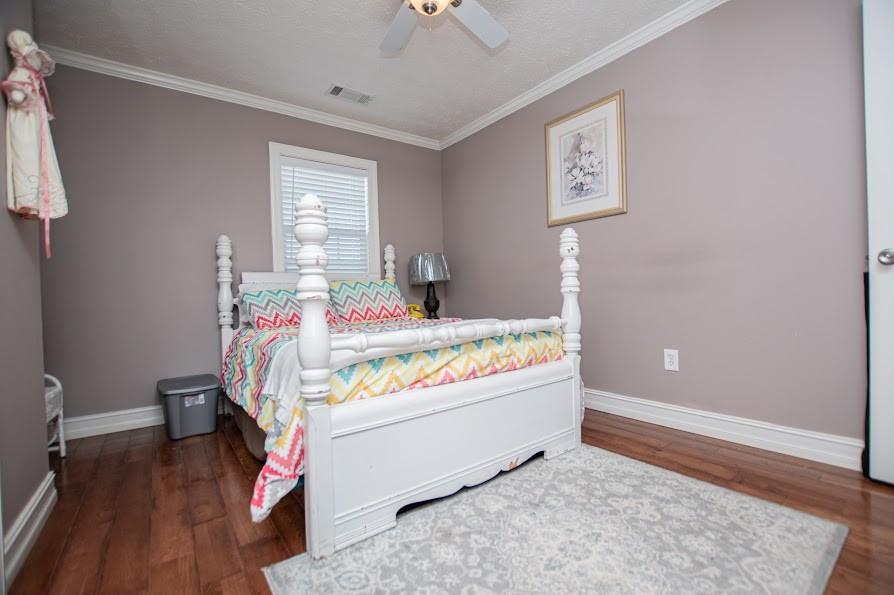 575 Liberty Church Road Carrollton, GA 30116 - Photo 43 of 95 a bed room with a bed and a window