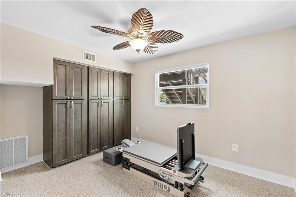 21531 Madera Road Fort Myers Beach, FL 33931 - Photo 21 of 49 a room with gym equipment