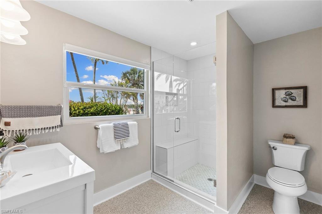 21531 Madera Road Fort Myers Beach, FL 33931 - Photo 22 of 49 a bathroom with a sink and toilet