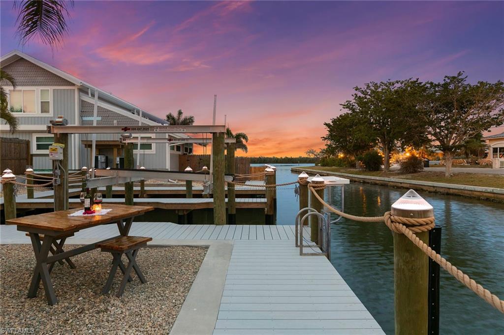 21531 Madera Road Fort Myers Beach, FL 33931 - Photo 41 of 49 a view of a balcony with chairs