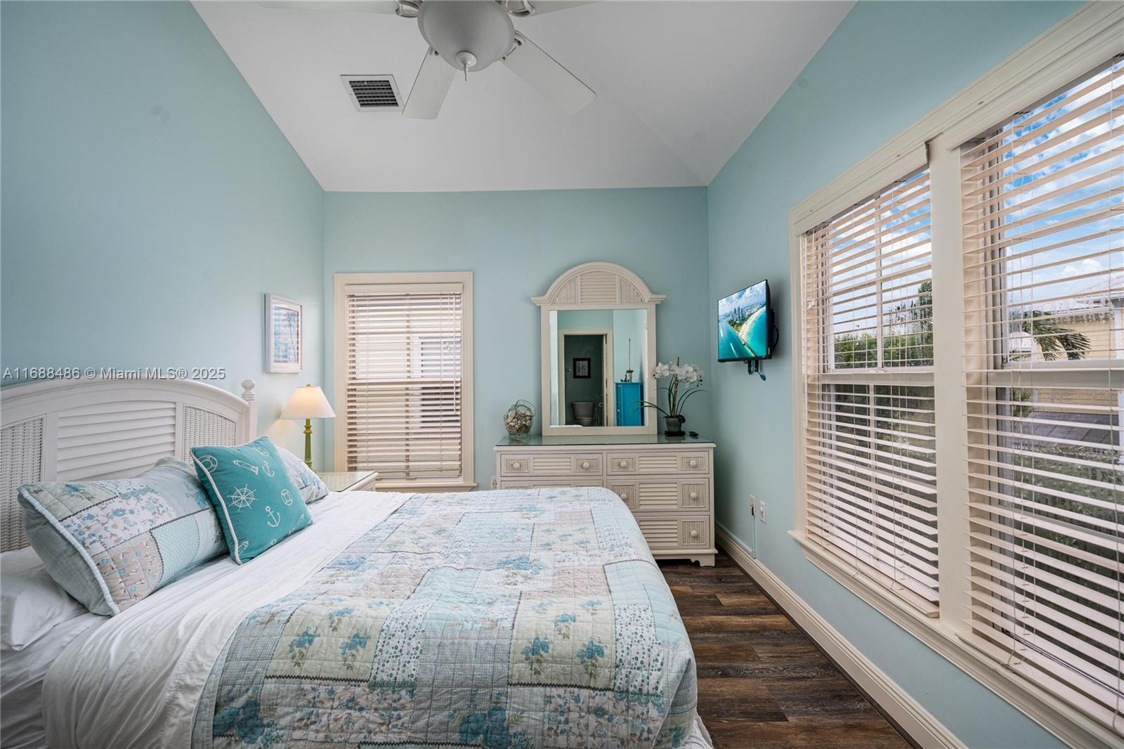 120 Anglers Way Islamorada, FL 33036 - Photo 15 of 36 a bedroom with a large bed and a large window