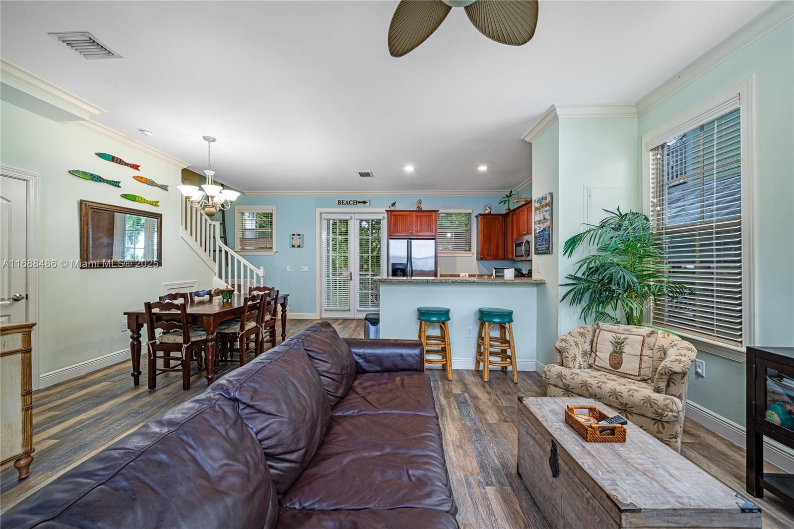 120 Anglers Way Islamorada, FL 33036 - Photo 6 of 36 a living room with furniture kitchen view and a large window