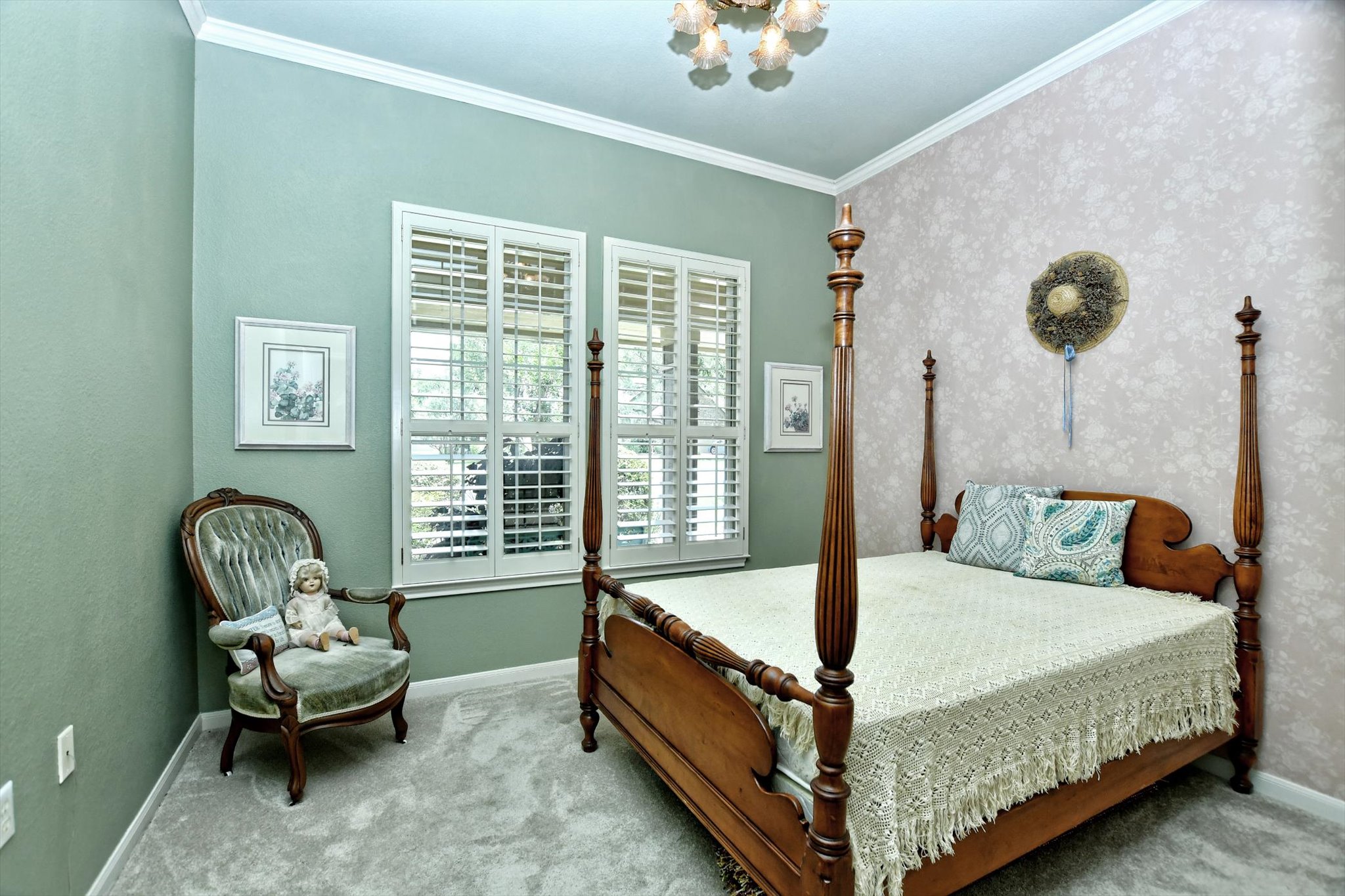 106 Nighthawk Way Georgetown, TX 78633 - Photo 20 of 29 Timeless elegance defines this bedroom with crown molding, plush carpeting, and charming window shutters.